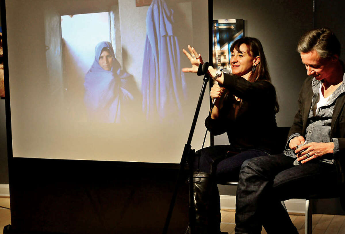 Hour photo / Erik Trautmann Westport native and renown photojournalist Lyndsey Addario holds a panel discussion with fellow photojournalist Spencer Platt at the Westport Arts Center Saturday as part of her book release, “On the Wire: Veiled Rebellion”.