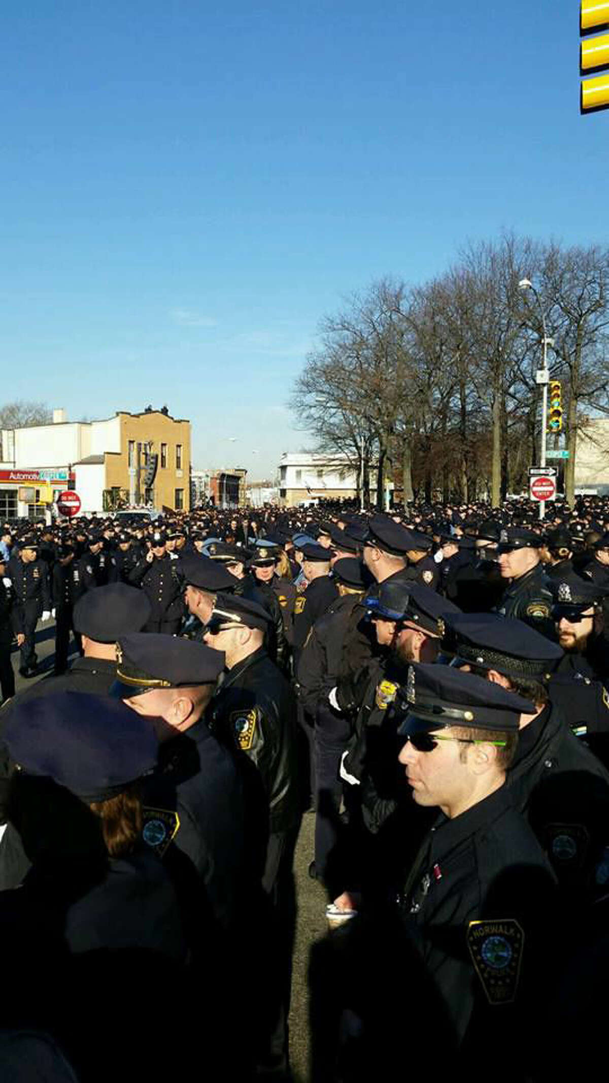 Contributed photo Over twenty members of the Norwalk Police Department attended the funeral of NYPD Officer Rafael Ramos in Queens on Saturday.