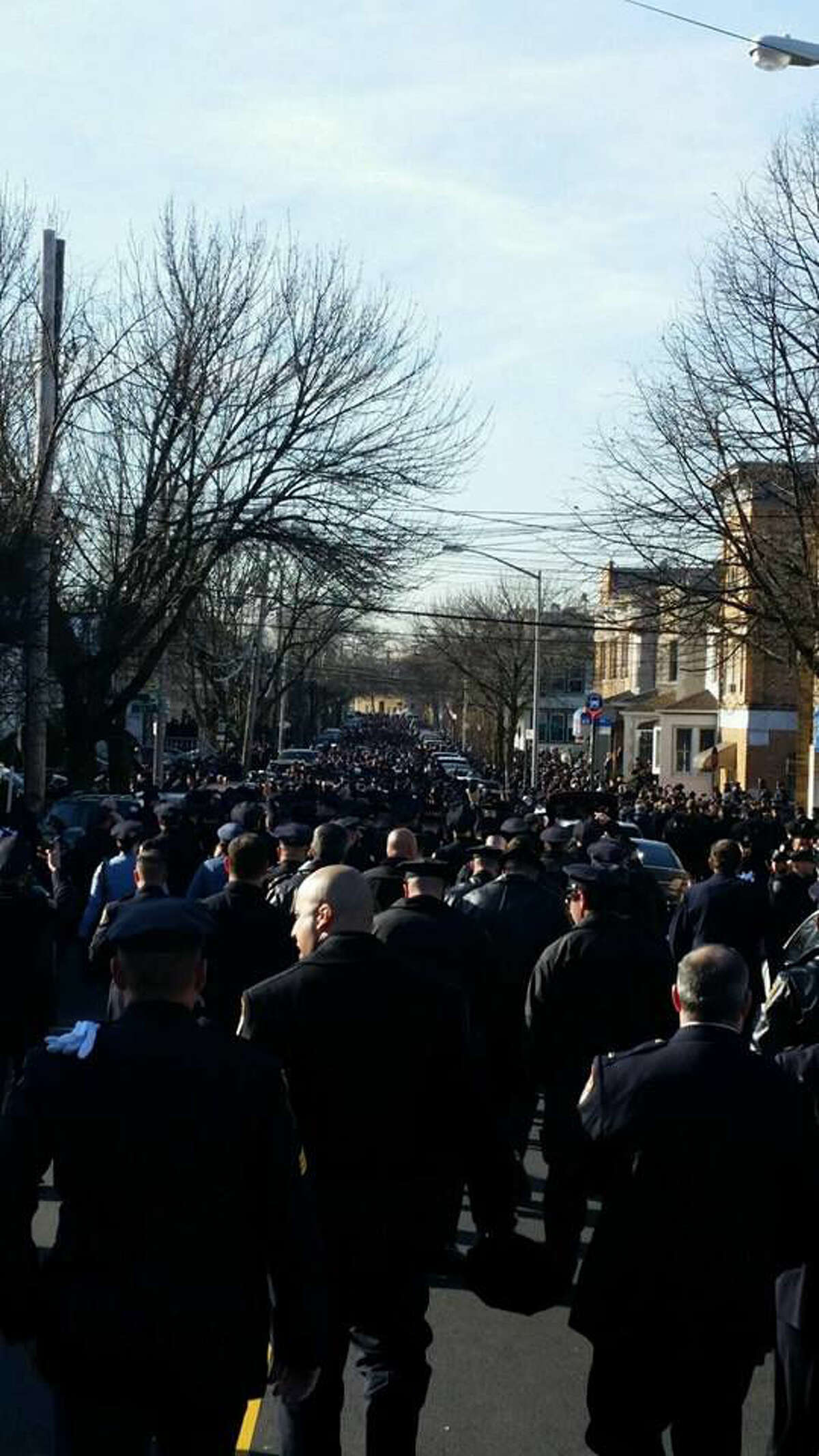 Contributed photo Over twenty members of the Norwalk Police Department attended the funeral of NYPD Officer Rafael Ramos in Queens on Saturday.