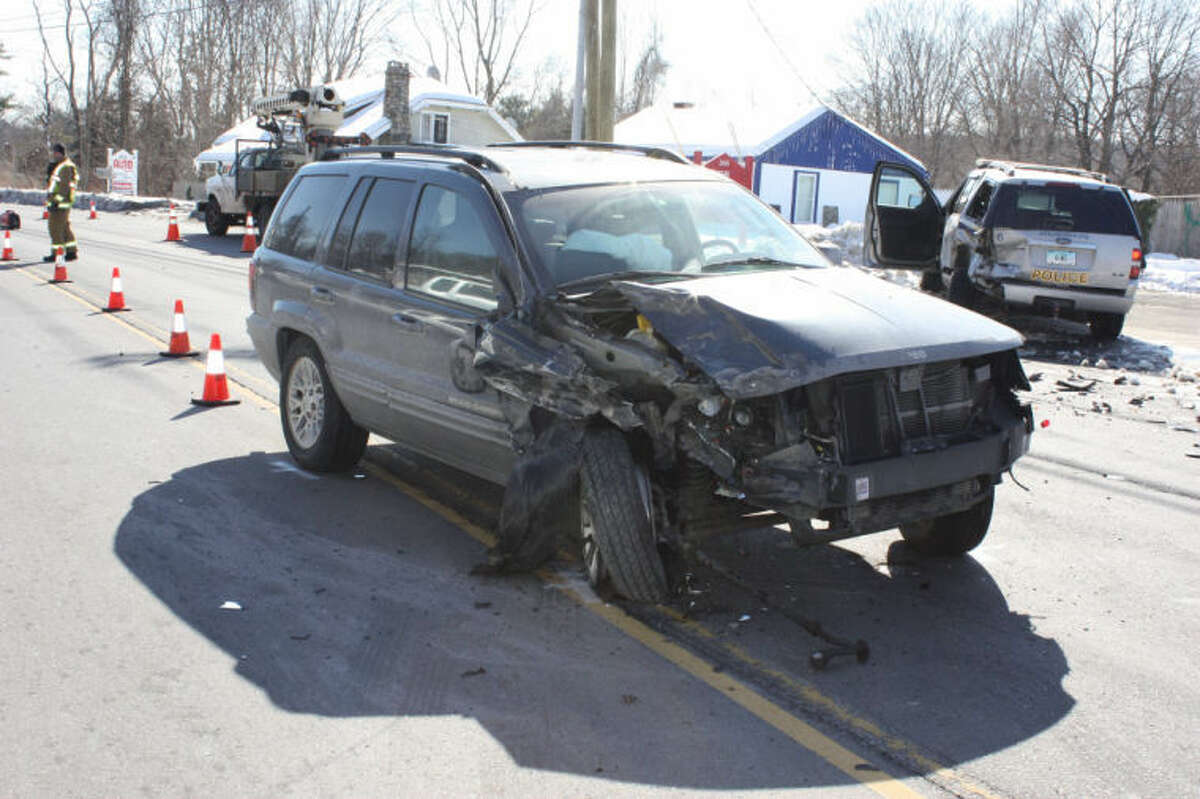 Driver charged in crash that sent Wilton officer to hospital