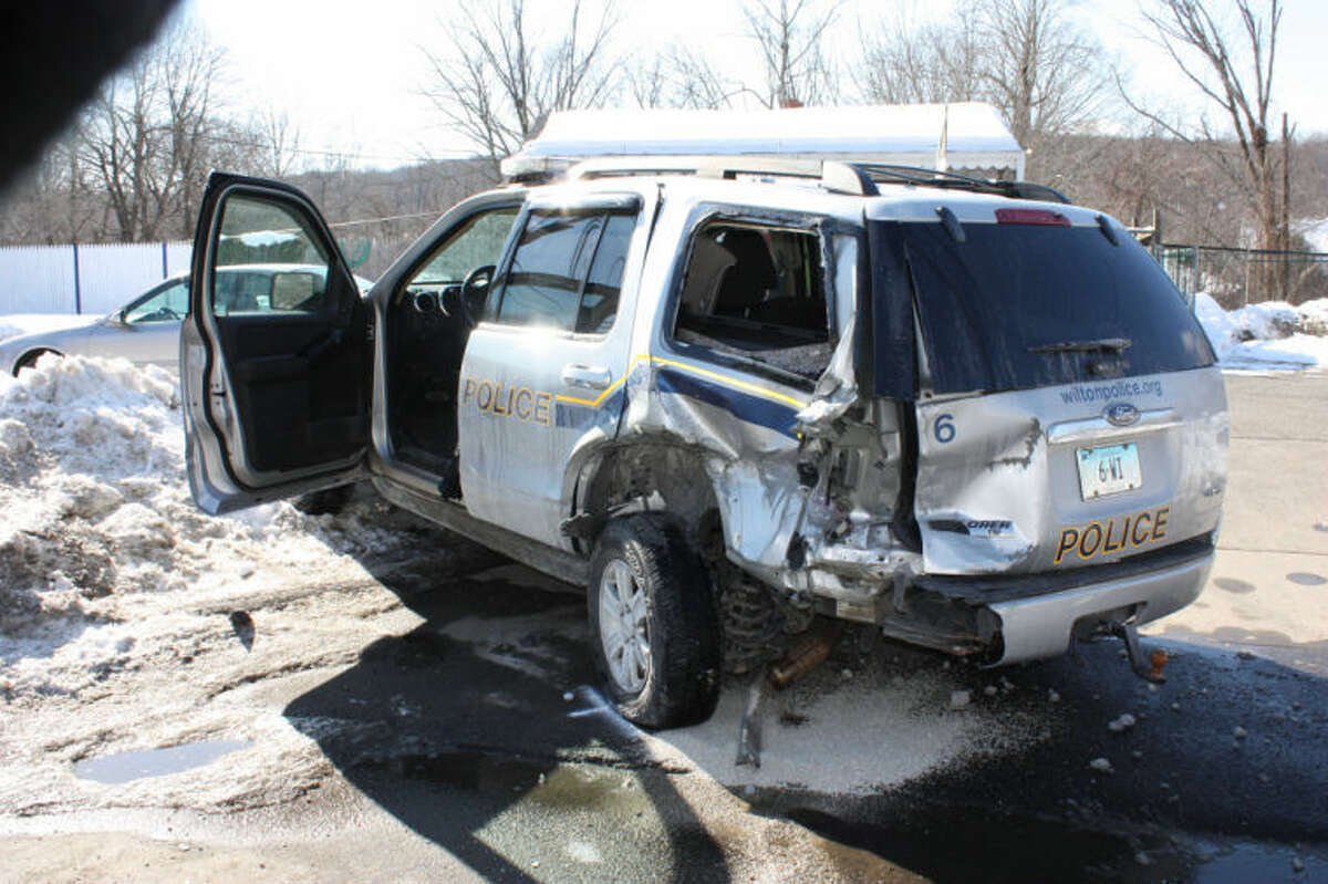 Driver charged in crash that sent Wilton officer to hospital