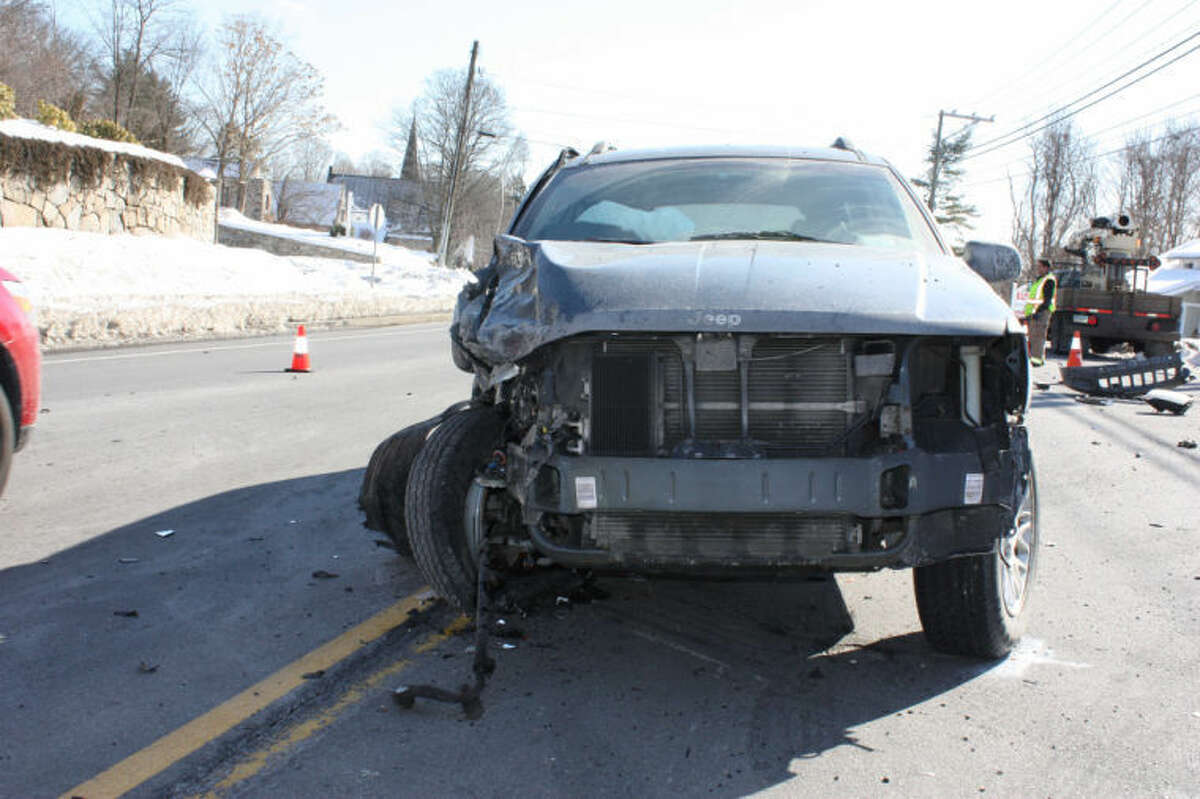 Driver charged in crash that sent Wilton officer to hospital