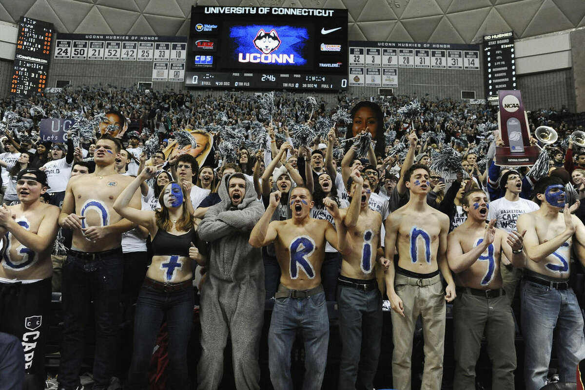 Connecticut fans cheer at the beginning of an NCAA college basketball game against South Carolina, Monday, Feb. 9, 2015, in Storrs, Conn. (AP Photo/Jessica Hill)