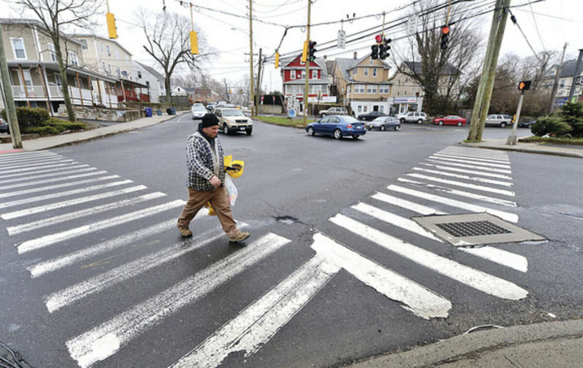 Hour photo / Erik Trautmann The Norwalk Department of Public Works is holding informational meeting April 22 on forthcoming replacement of 10 traffic signals and related pedestrian improvements along key arteries in Norwalk including the intersection at Route 1 and Main St.