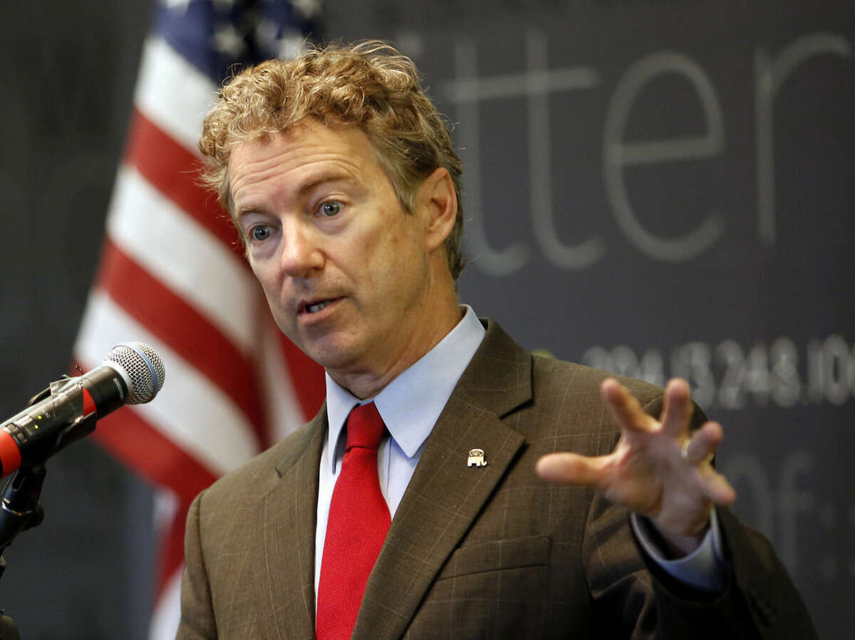 FILE - In this March 20, 2015, file photo, Sen., Rand Paul, R-Ky. speaks in Manchester, N.H. Ready to enter the Republican chase for the party’s presidential nomination this week, the first-term Kentucky senator has designs on changing how Republicans go about getting elected to the White House and how they govern once there. Paul will do so with an approach to politics that is often downbeat and usually dour, which just might work in a nation deeply frustrated with Washington. (AP Photo/Jim Cole, File)