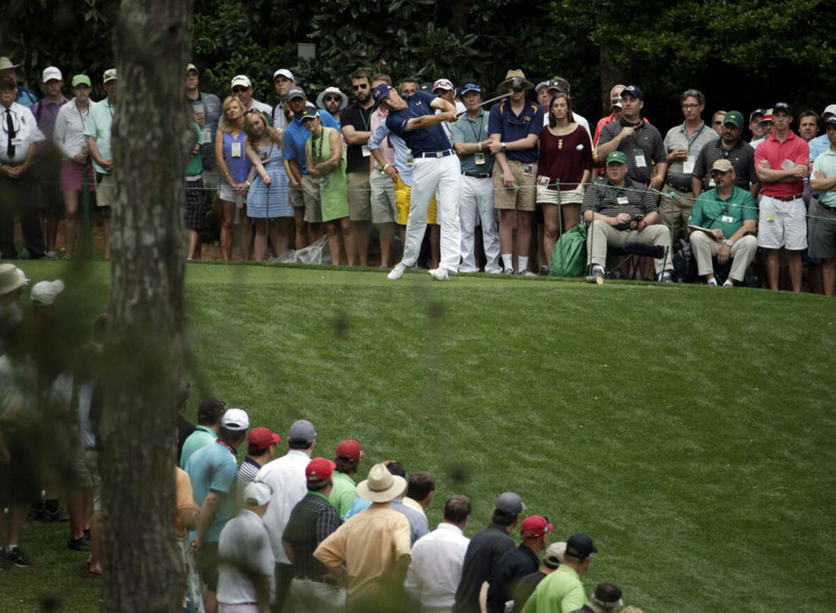 Jordan Spieth tees off on the 11th hole during the fourth round of the Masters golf tournament Sunday, April 12, 2015, in Augusta, Ga. (AP Photo/Charlie Riedel)