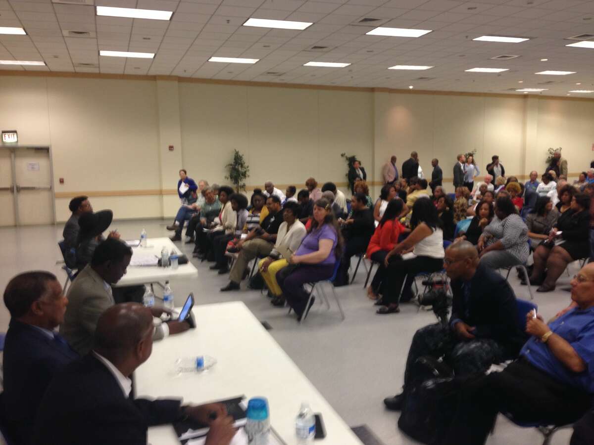 Candidates answer questions at Precinct 1 commissioner Democratic Party forum.