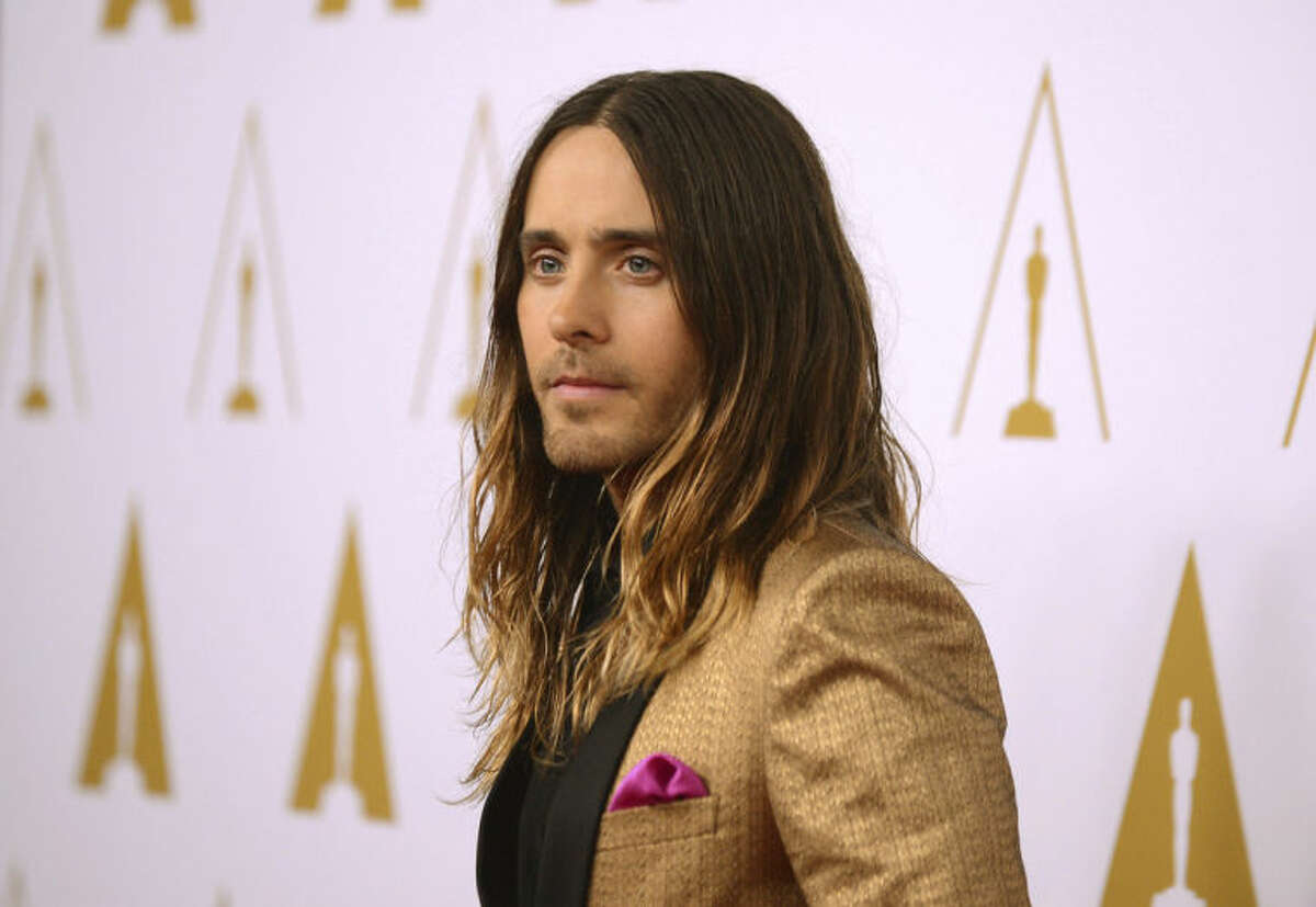FILE - In this Monday, Feb. 10, 2014 file photo, actor Jared Leto arrives at the 86th Oscars Nominees Luncheon, in Beverly Hills, Calif. Leto is nominated for an Academy Award for performance by an actor in a supporting role in the film, "The Dallas Buyer's Club." The key to making a red carpet splash is color; and men are getting more colorful like Leto at the nominees luncheon. (Photo by Jordan Strauss/Invision/AP)