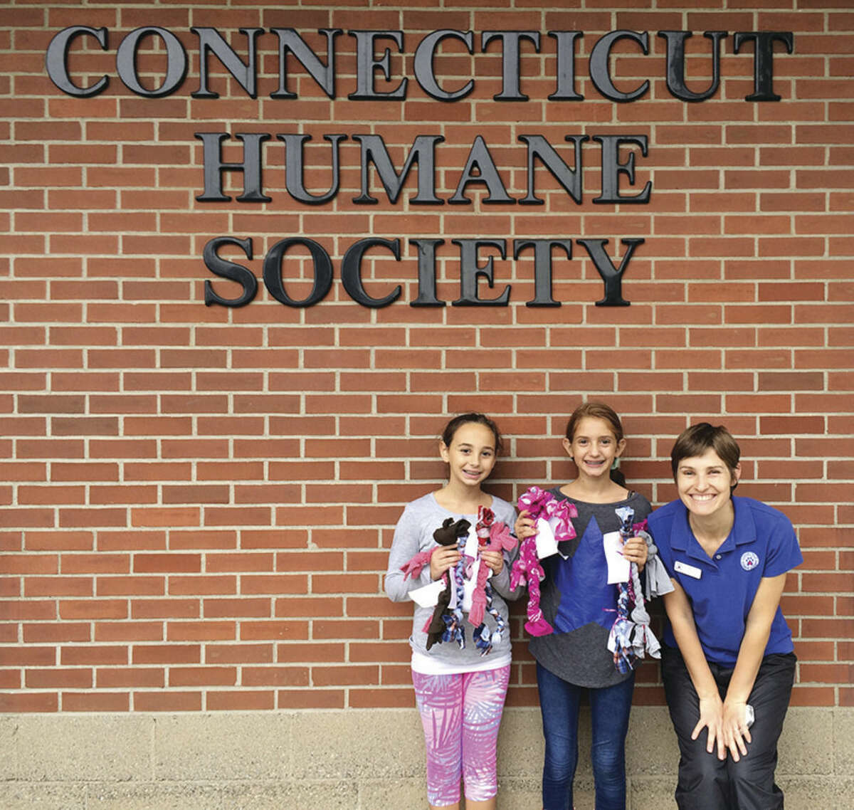 Girls Scouts make homemade chew toys for sheltered pets image