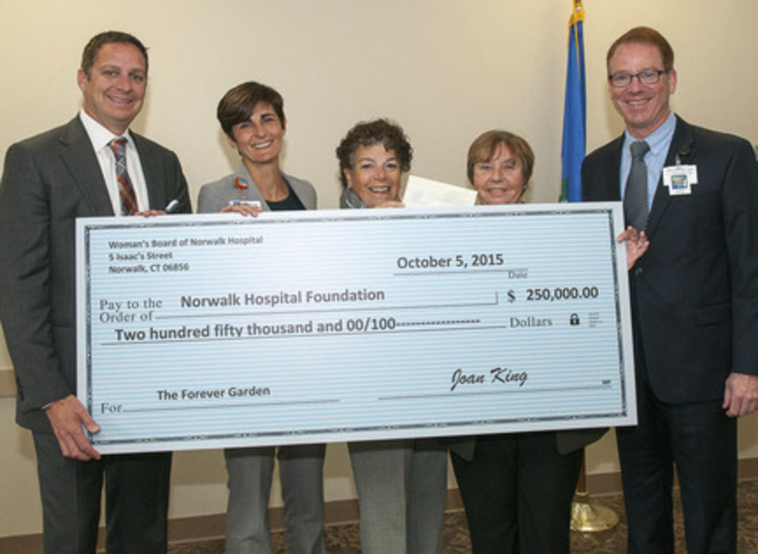 Women's Board of Norwalk Hospital presents 250k check to hospital