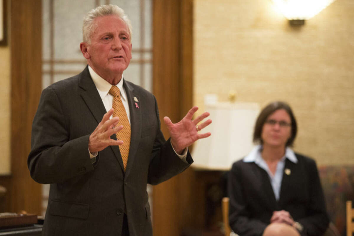 Hour photo/Chris Palermo Norwalk Mayor Harry Rilling speaks alongside his runningmate Kelly Straniti at the "Meet the Candidates" event hosted by the East Norwalk Business Association at 25 Van Zant St. Tuesday night.