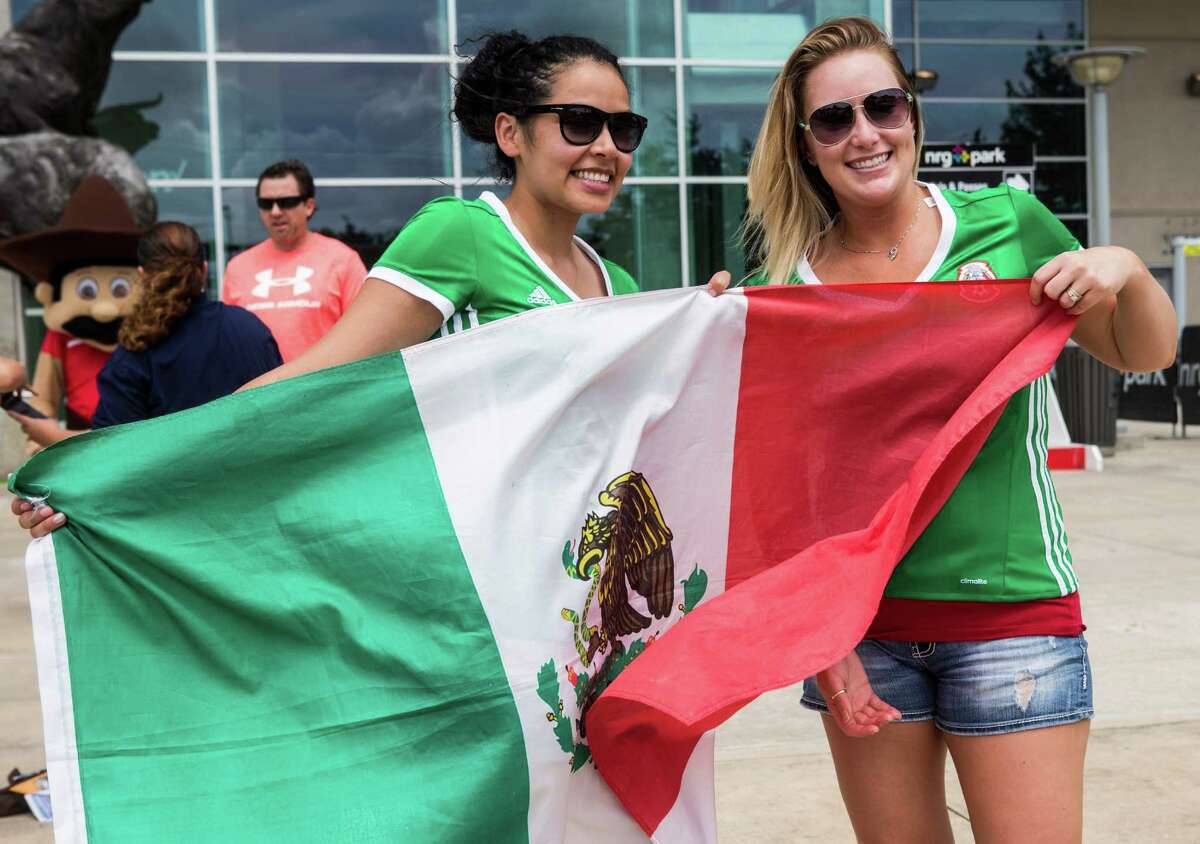 Soccer fans arrive outside NRG Stadium before the Copa America match between Mexico and Venezuela on Monday, June 13, 2016, in Houston.