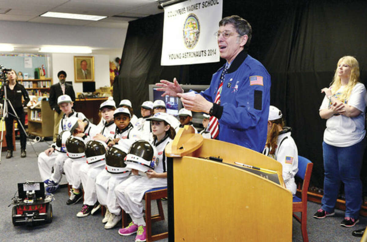 Hour photo / Erik Trautmann Teacher and Mission Commander and Chief Andrew Pearce addresses his astronauts as Columbus Magnet School observes the 19th annual Young Astronaut mission, Terra Nova simulated landing at Friday morning.