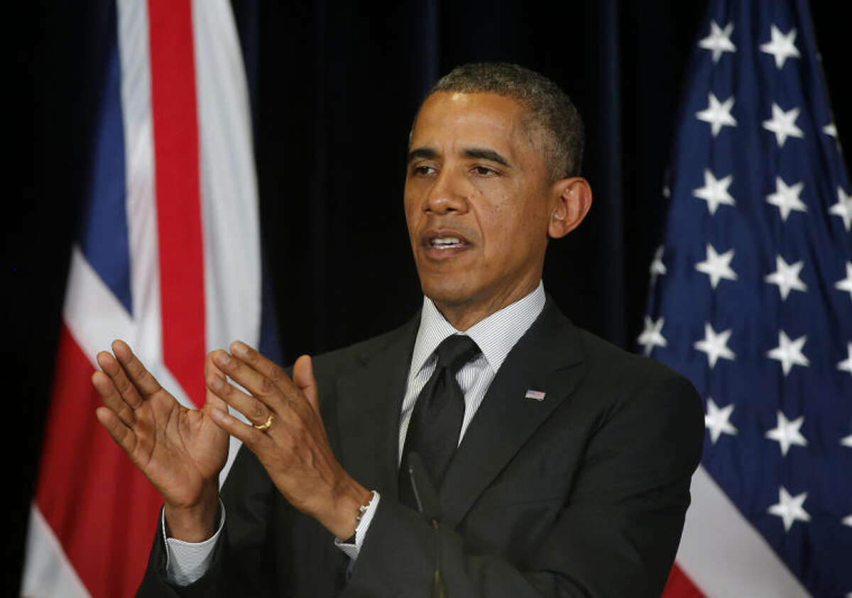 President Barack Obama speaks during a joint news conference with British Prime Minister David Cameron at the G7 summit in Brussels, Belgium, Thursday, June 5, 2014. (AP Photo/Charles Dharapak)
