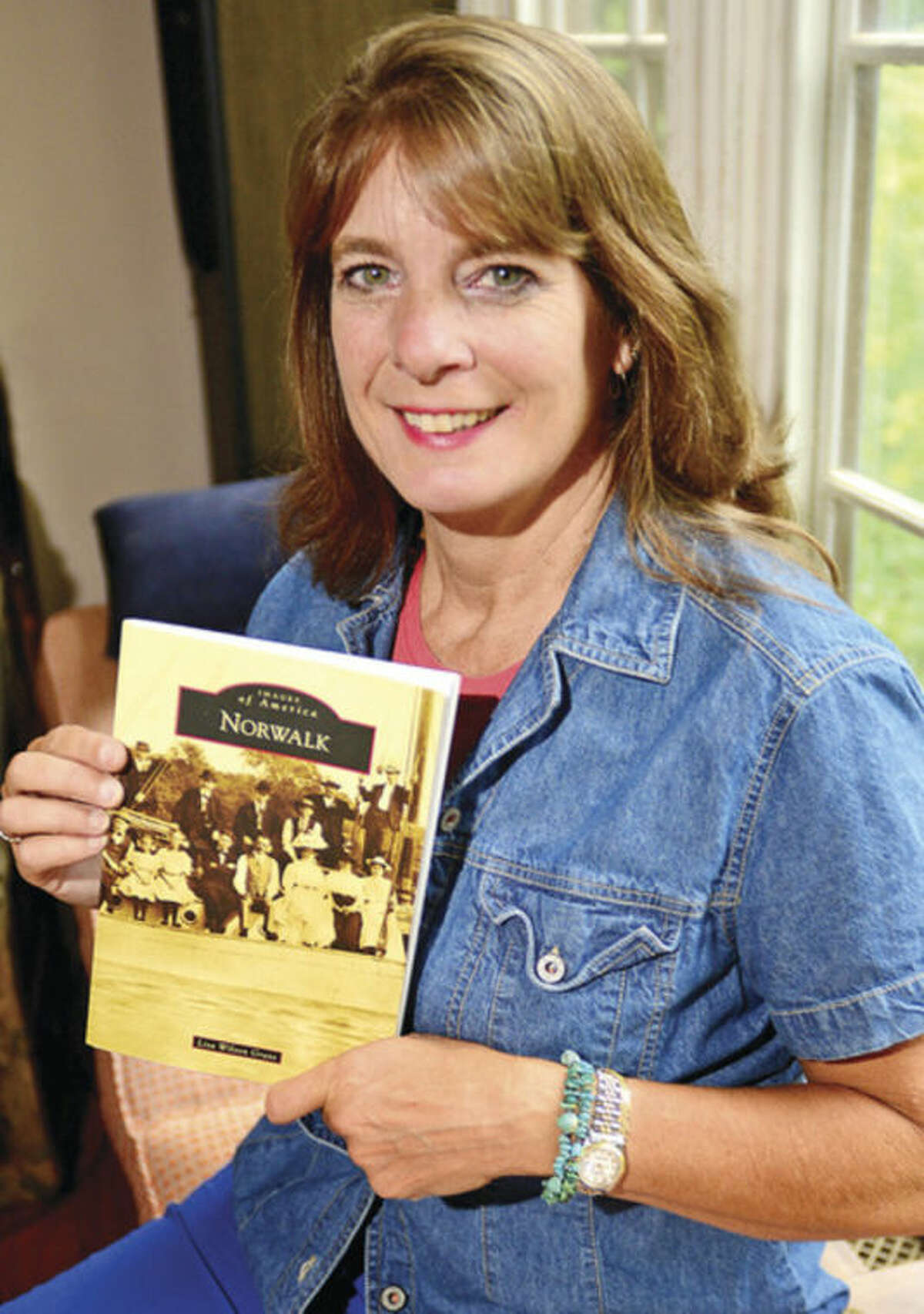 Hour photo / Erik Trautmann Lisa Wilson Grant has a newly published book "Norwalk", a pictoral history of the city.
