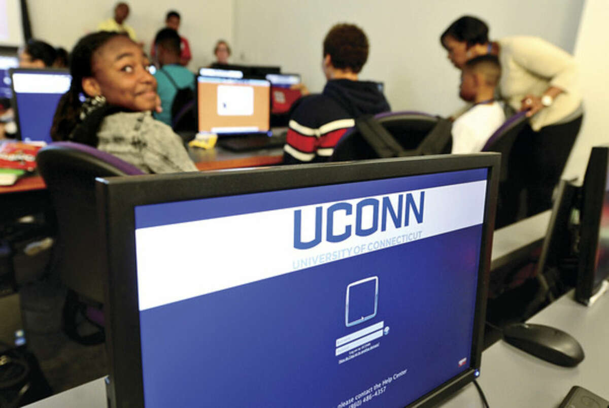 Hour photo / Erik Trautmann Incoming high school freshmen learn the Naviance computer platform at the UCONN Stamford campus Tuesday as part of the Stamford Achieves pilot summer bridge program that prepares students for the first year of high school.
