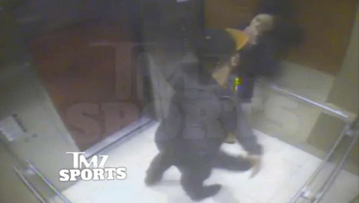 In this still image taken from a hotel security video released by TMZ Sports, Baltimore Ravens running back Ray Rice punches his fiancee, Janay Palmer, in an elevator at the Revel casino in Atlantic City, N.J., in February 2014. The Ravens terminated their contract with Rice Monday, Sept. 8, 2014, hours after the video surfaced on TMZ's website, and he was suspended indefinitely by the NFL. (AP Photo)