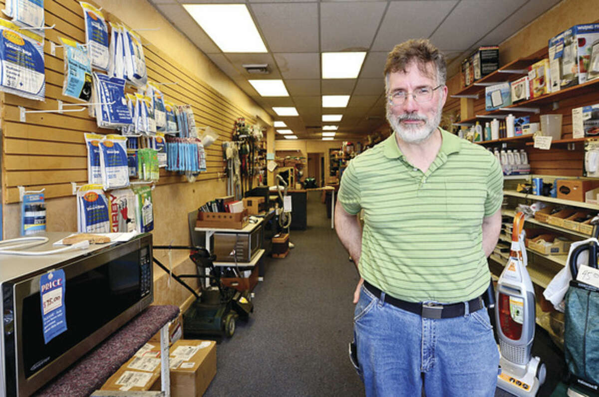 Hour photo / Erik Trautmann Owner of Appliance Service Center of Norwalk, Thomas O'Flaherty, will be closing his doors after 29 years.