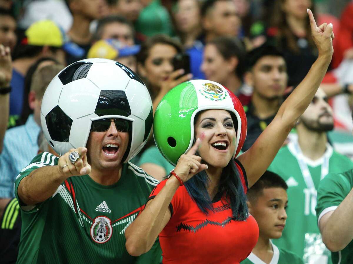 Mexico fans cheer during the first half of a Copa America Centenario group C soccer match against Venezuela on Monday, June 13, 2016, in Houston.