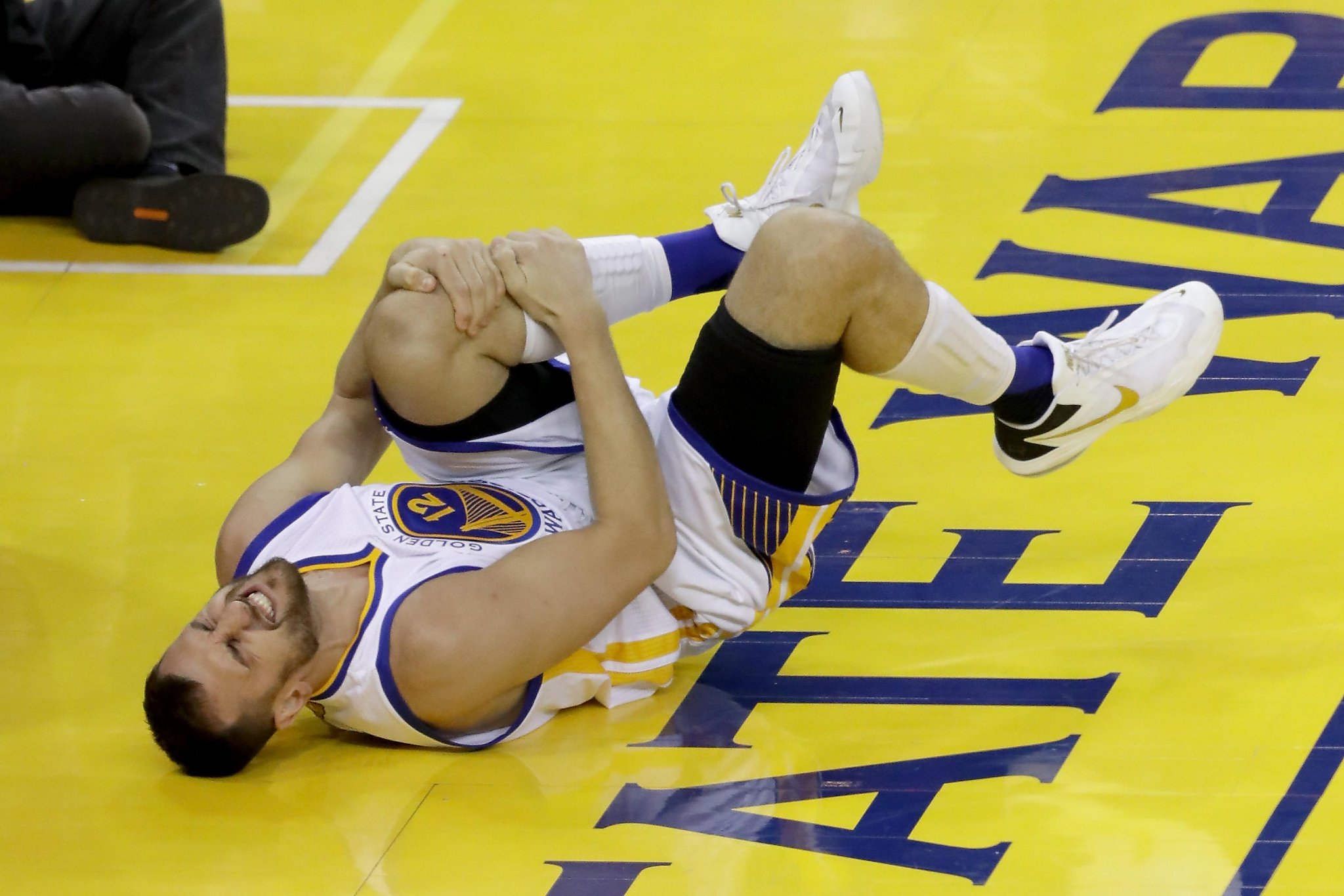 Warriors lose Andrew Bogut for remainder of NBA Finals with left knee injury