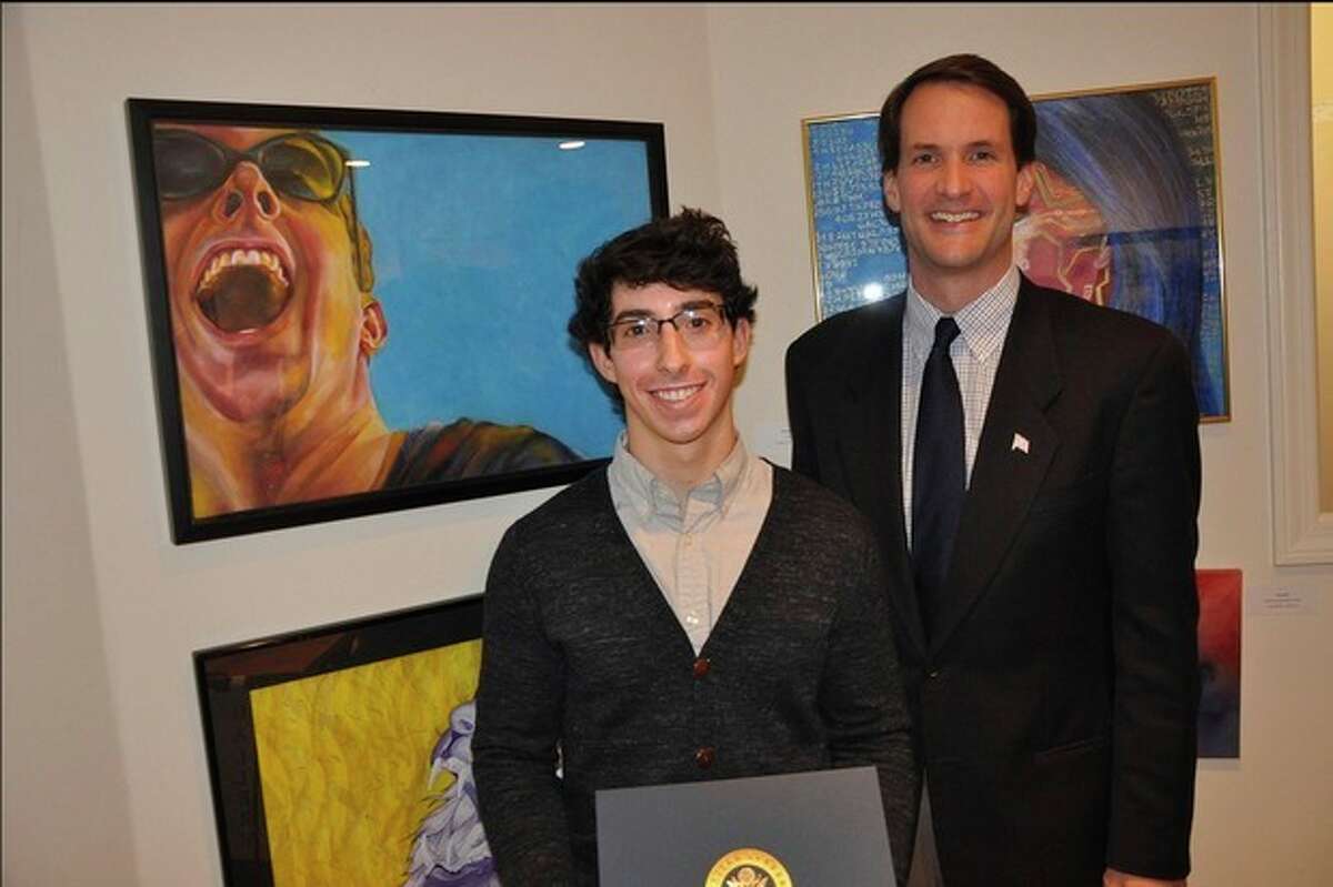 Contributed photo Congressman Jim Himes with Gabriel Schindler of Staples High School and his winning entry, "Sunshine."
