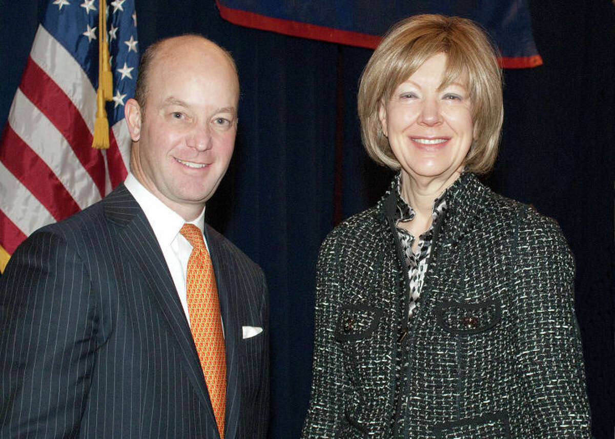 Stephen Gallucci, managing partner of the Greater Fairfield County Practice for Deloitte, which was the sponsor of Friday morning?•s event, stands with presenter Rae Rosen, Vice President and Regional Economist, The Federal Reserve Bank of New York.Ê