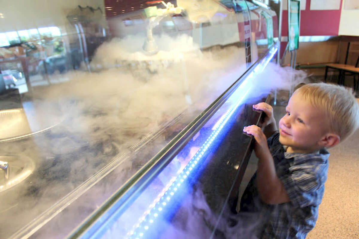 Sub Zero ice Cream will open June 17 at 15810 Southwest Fwy. in Sugar Land. The ice cream is made to order using liquid nitrogen. Shown: A child watching the ice cream making process.