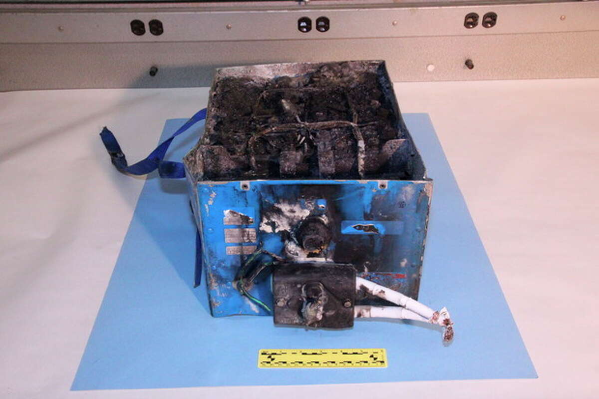 This undated image provided by the National Transportation Safety Board shows the burned auxiliary power unit battery from a JAL Boeing 787 that caught fire on Jan. 7, 2013, at Boston's Logan International Airport. Federal officials said on Wednesday, Jan. 16, 2013, that they are temporarily grounding Boeing's 787 Dreamliners until the risk of possible battery fires is addressed. (AP Photo/National Transportation Safety Board)