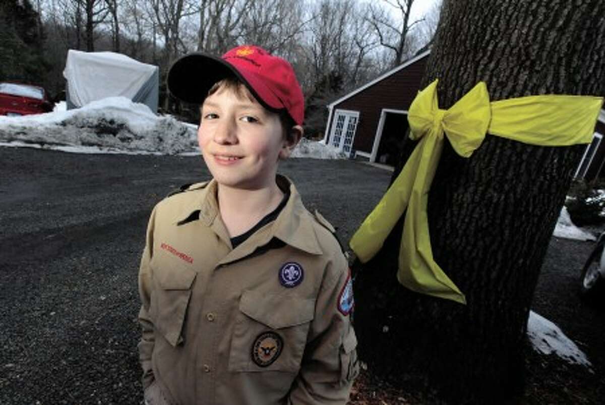 Badges? These brothers are earning ALL the stinking Boy Scout