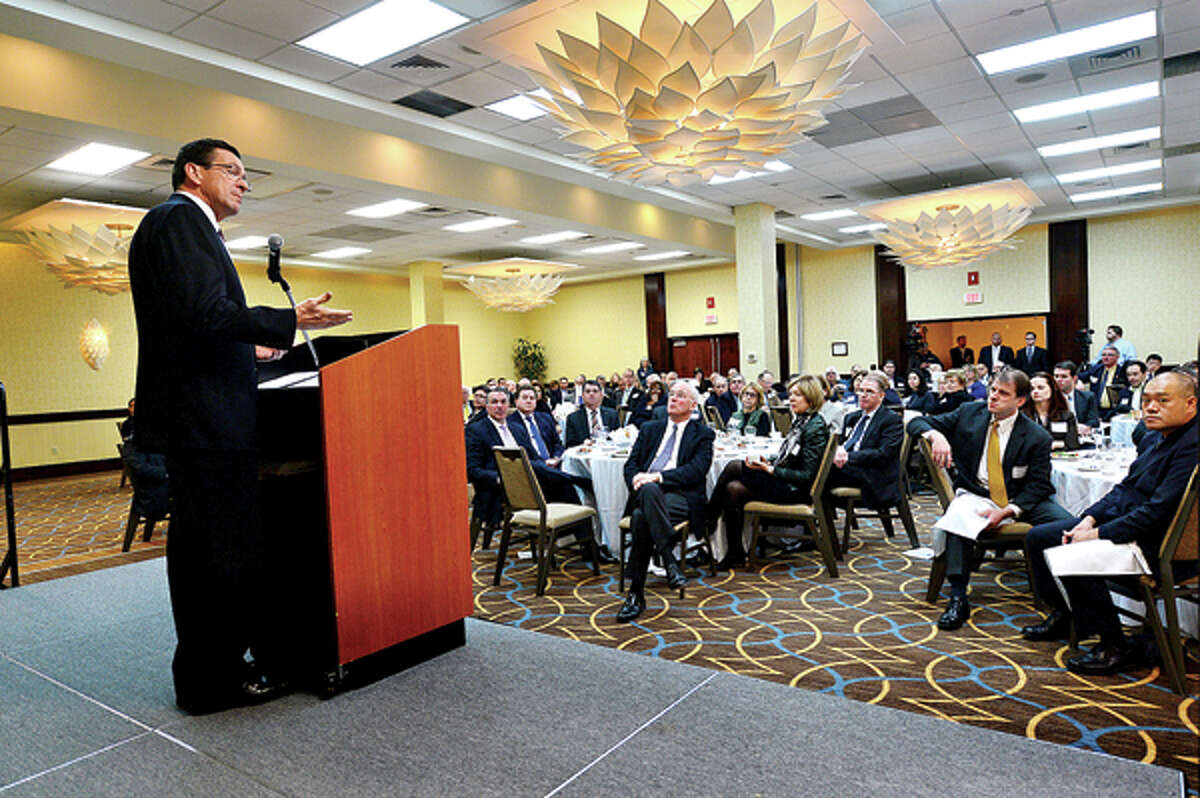 Featured speaker Governor Dannel P. Malloy addressses the crowd at the Business Council of Fairfield County’s Winter Luncheon at the Stamford Sheraton Wednesday. Hour photo / Erik Trautmann