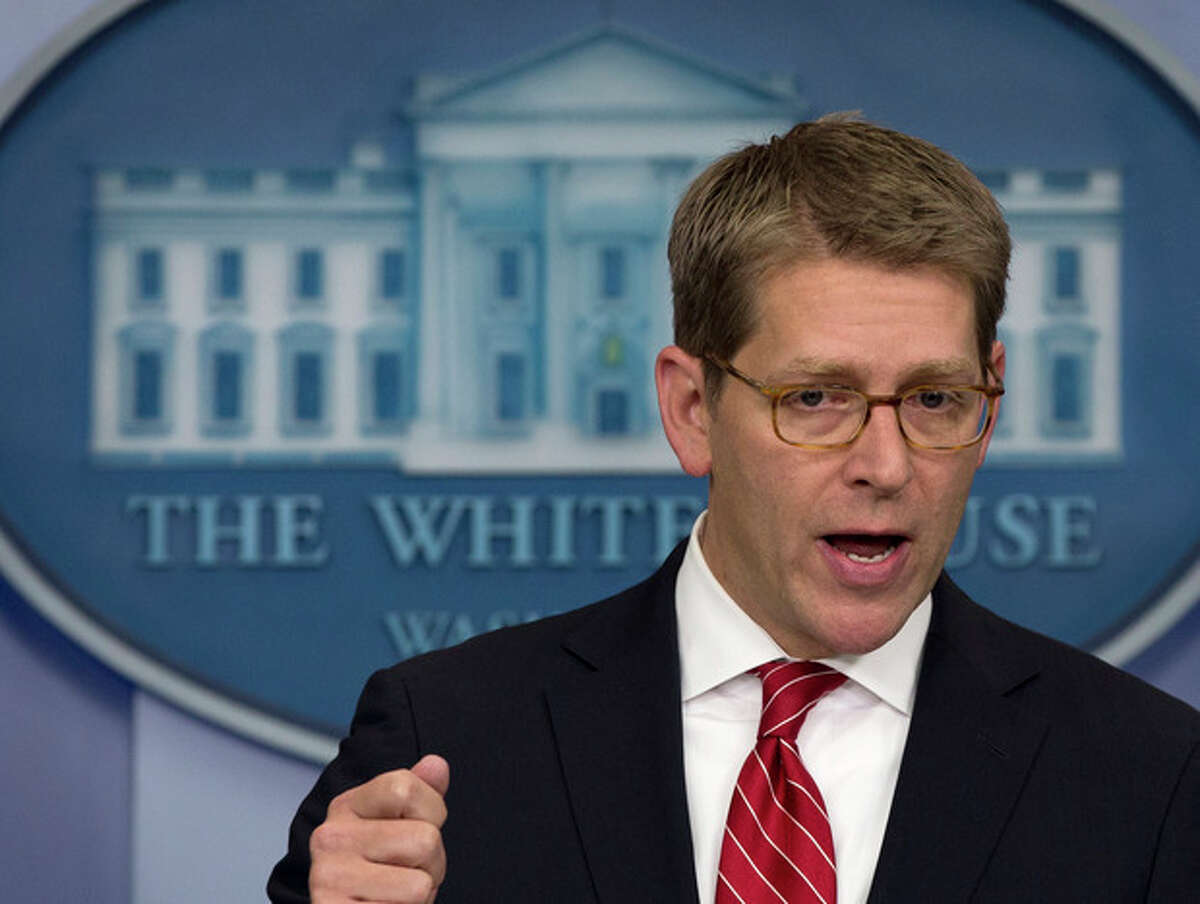 White House press secretary Jay Carney gesture as he speaks during his daily news briefing at the White House in Washington, Wednesday, Jan. 23, 2013. (AP Photo/Carolyn Kaster)