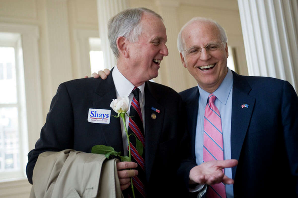 Former Connecticut U.S. Rep. Christopher Shays, right, shares a light moment with former U.S. Rep. Rob Simmons after Shays formally announced he is running as a Republican candidate for U.S. Senate at the Old State House in Hartford, Conn., Wednesday, Jan. 25, 2012. Shays joins four others seeking the GOP nomination. (AP Photo/Jessica Hill)