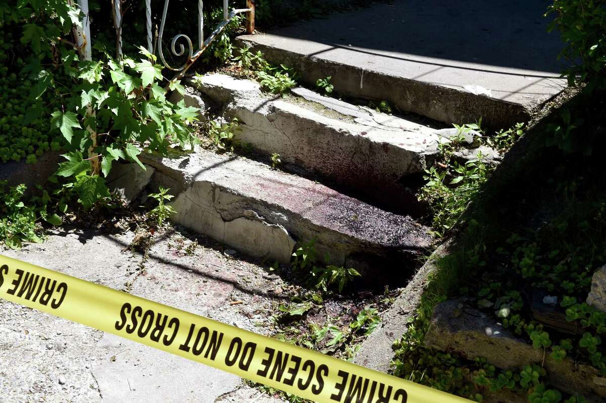 Blood from the scene of a shooting on the front steps of 1339 First Avenue on Tuesday, June 14, 2016, in Schenectady, N.Y.