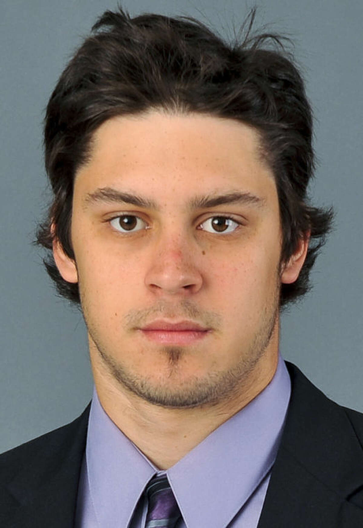 In an Aug. 29, 2010, photo provided by Quinnipiac University, Quinnipiac goalie Eric Hartzell poses for a photo in Hamden. Conn. The Bobcats are 18-3-3, unbeaten in their last 17 games and ranked second in the nation on Jan. 29. Hartzell leads the nation with a goals-against average of 1.46. (AP Photo/Quinnipiac University, John Hassett)
