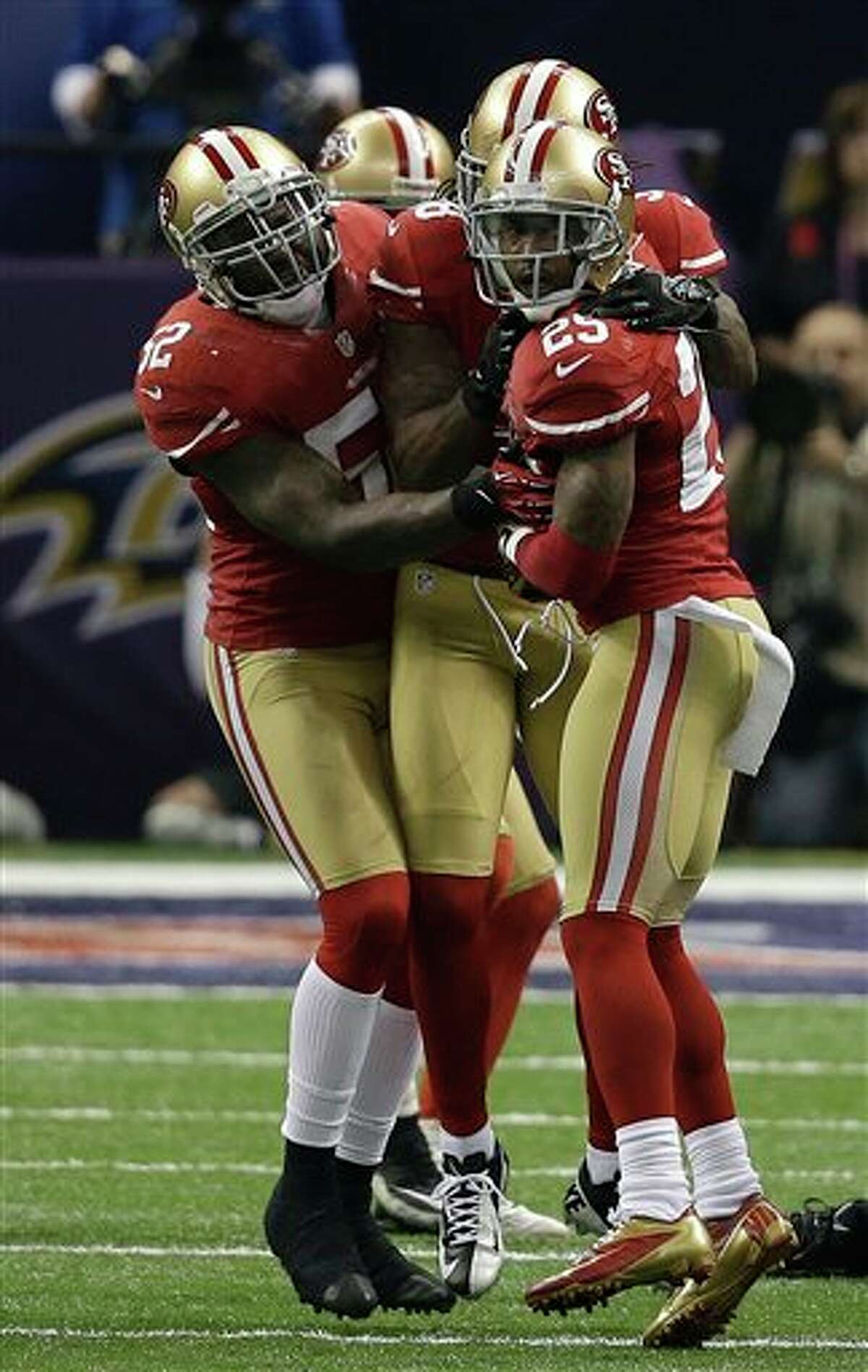 San Francisco 49ers linebacker Patrick Willis (52) gives a high