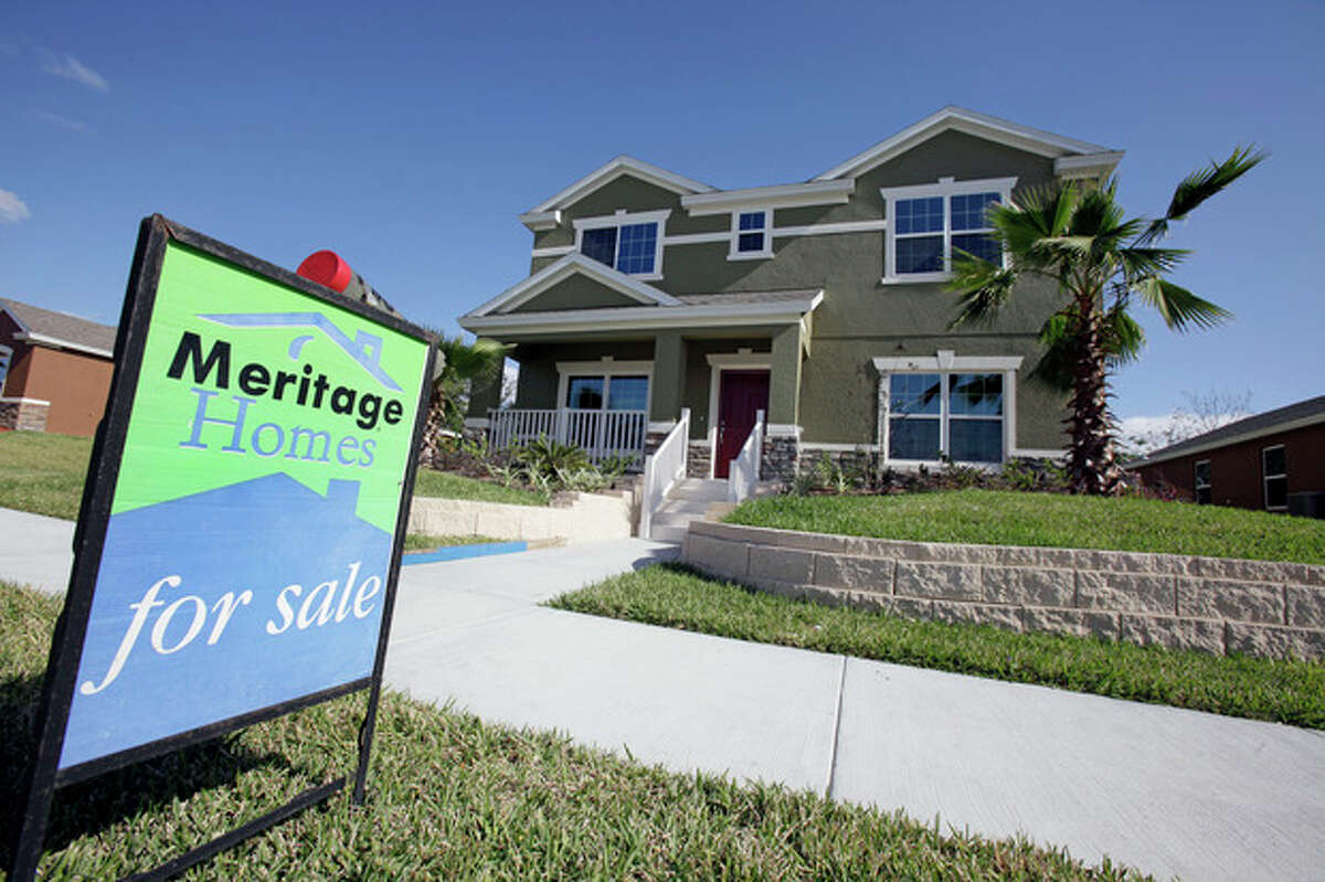This Dec. 20, 2011 photo, shows a new home for sale in Winter Garden, Fla. U.S. home prices fell in most major cities for the second straight month, further evidence that the housing recovery will be bumpy. (AP Photo/John Raoux)