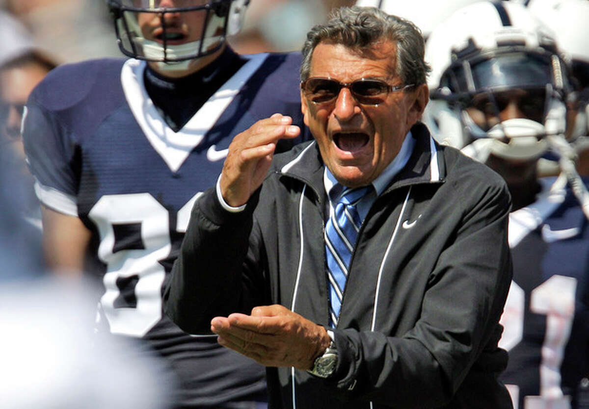 FILE - In this Sept. 5, 2009, file photo, Penn State coach Joe Paterno yells to an official during the first half of an NCAA college football game against Akron in State College, Pa. On Sunday, Jan. 22, 2012, family says Paterno, winningest coach in major college football, has died. (AP Photo/Carolyn Kaster)