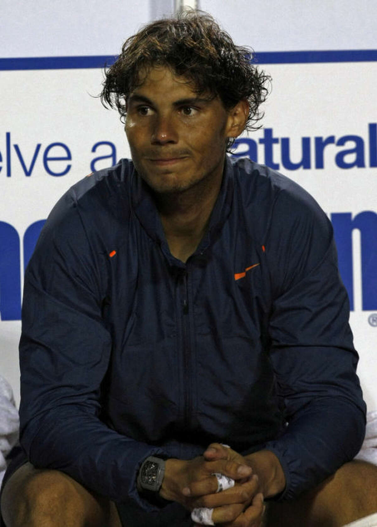 Spain's Rafael Nadal sits at the end of the VTR Open final tennis game against Argentina's Horacio Zeballos in Vina del Mar, Chile, Sunday, Feb. 10, 2013. Nadal lost to Zeballos 6-7 (2), 7-6 (6), 6-4 in Sunday's final of the VTR Open, the Spaniard's comeback tournament after seven months out with a torn tendon in his left knee. (AP Photo/Luis Hidalgo)