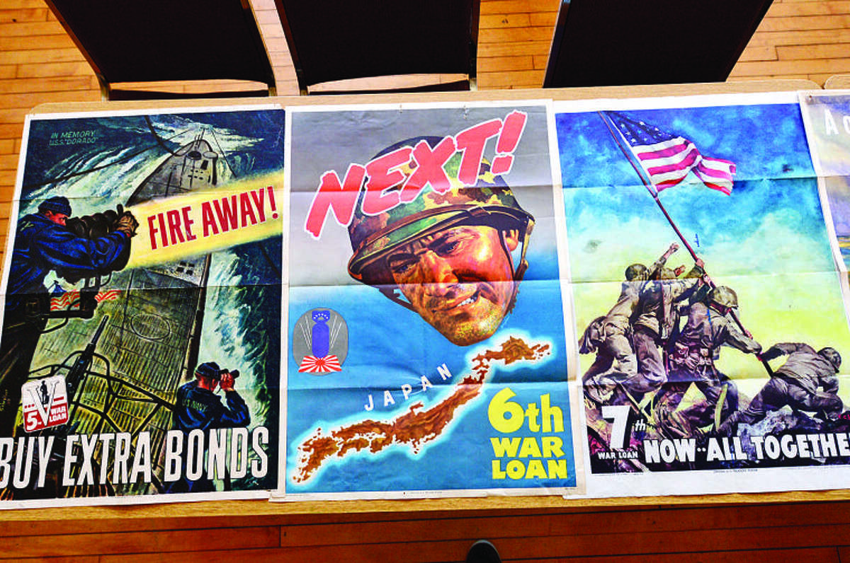 Hundreds of magazines, newspapers, photos and propaganda from the World War II era on display at theGeorgetown Community Association Center, wher many of the exhibitions are taken from area residents’ personal collections. Hour photo / Erik Trautmann