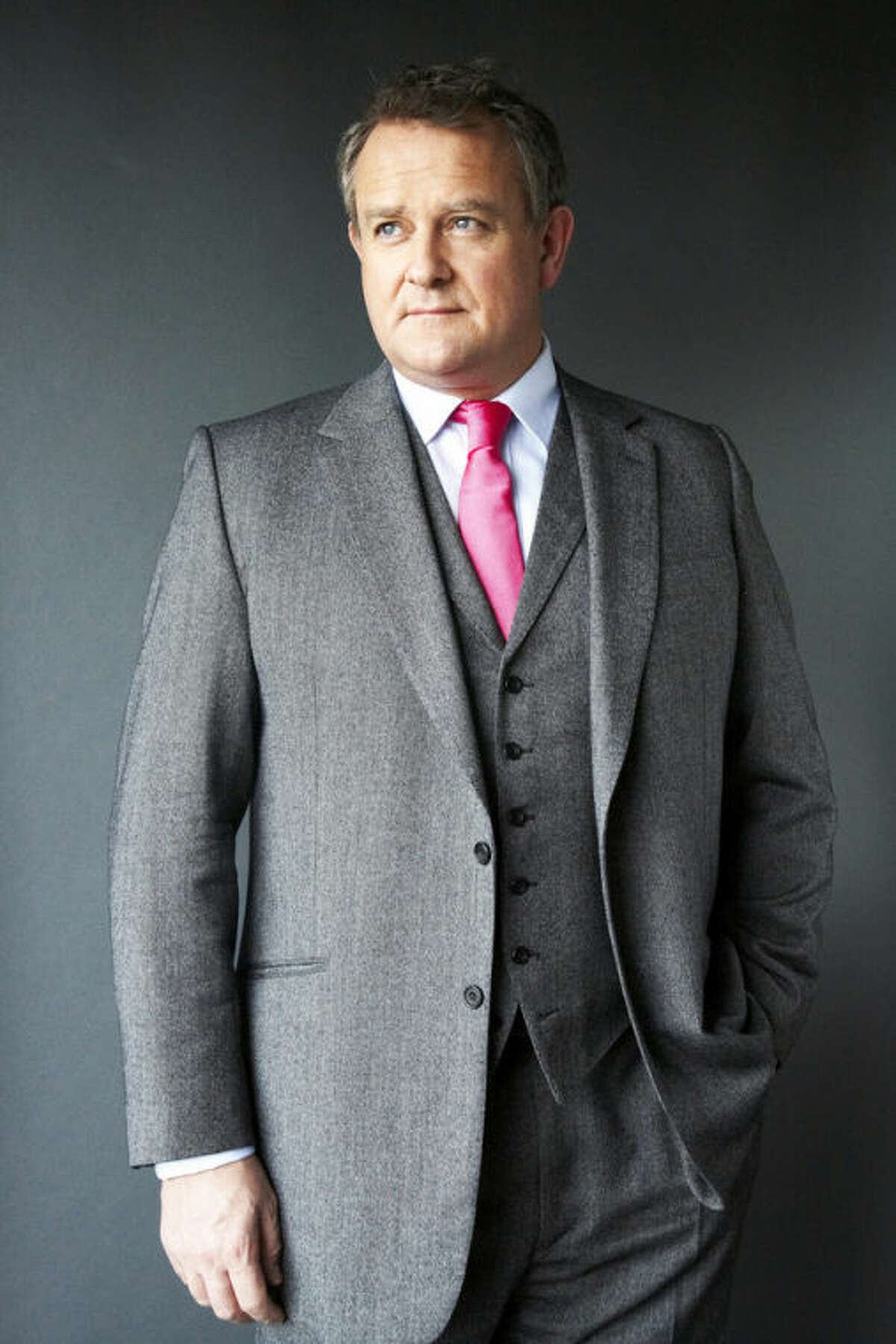 FILE - This Dec. 12, 2012 file photo shows British actor Hugh Bonneville in New York. Bonneville portrays the patriarchal Lord Grantham in the series, "Downton Abbey." The season three finale airs Sunday, Feb., 17 on PBS. (Photo by Dan Hallman/Invision/AP)