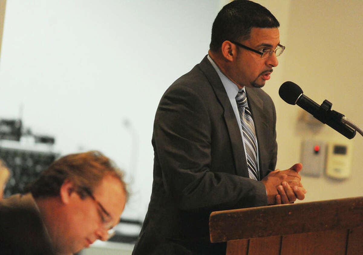 Rick Cruz, Commissioner of the Latino Puerto Rican Affairs Commission in Bridgep[ort speaks at the Reapportionment Committee meeting Monday at Norwalk City Hall. hour photo/matthew vinci