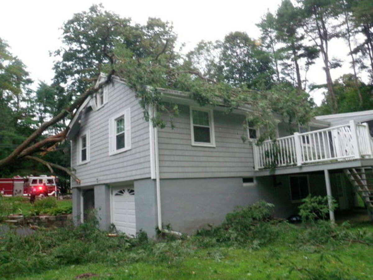 Tree falls on house in Westport