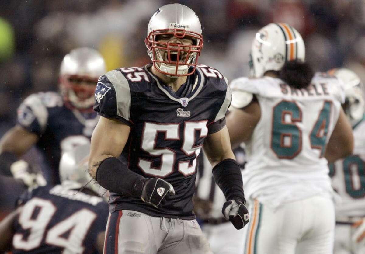 FILE - In this Dec. 23, 2007, file photo, New England Patriots linebacker Junior Seau (55) reacts after a defensive play during a football game against the Miami Dolphins in Foxborough, Mass. Police say Seau, a former NFL star, was found dead at his home in Oceanside, Calif., Wednesday, May 2, 2012, after responding to a shooting there. He was 43. (AP Photo/Elise Amendola, File)