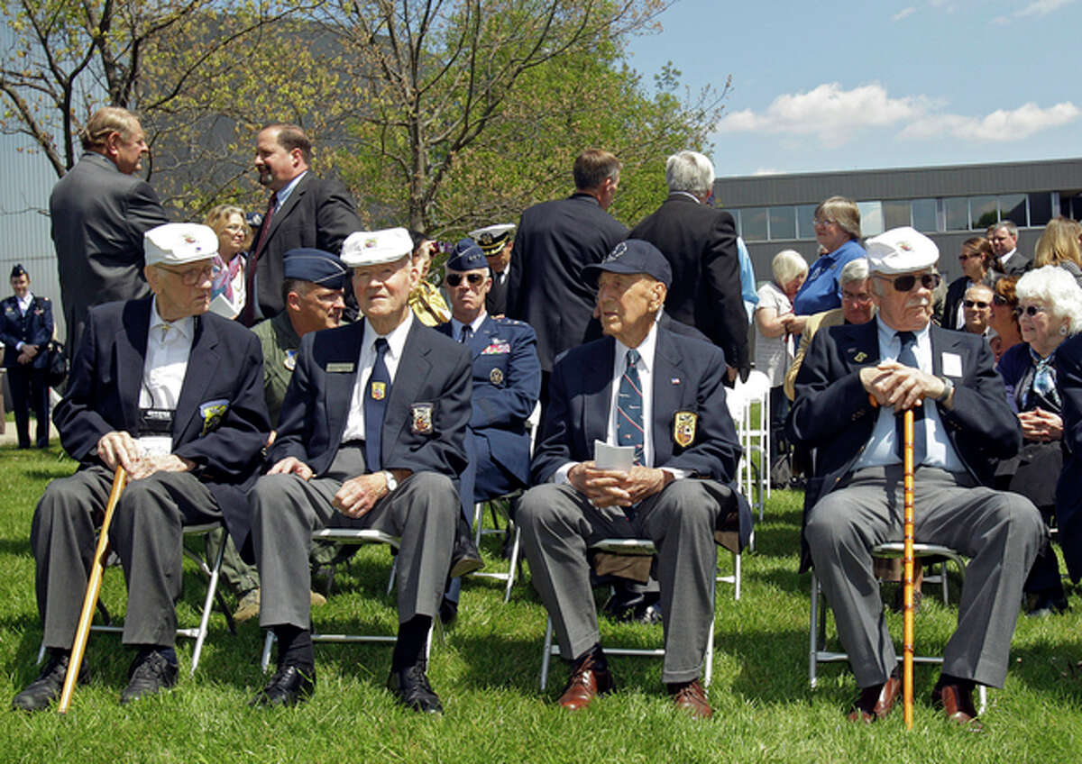 FILE - In this Wednesday, April 18, 2012 photo, four of the five surviving members of the Doolittle Raiders, front row from left: Thomas C. Griffin, David J. Thatcher, Richard E. Cole and Edward J. Saylor, sit during a reunion at the National Museum of the United States Air Force in Dayton, Ohio. Griffin, a B-25 bomber navigator in the World War II bombing raid on mainland Japan, died Tuesday, Feb. 26, 2013 in a VA nursing home at the age of 96. (AP Photo/Mark Duncan, File)