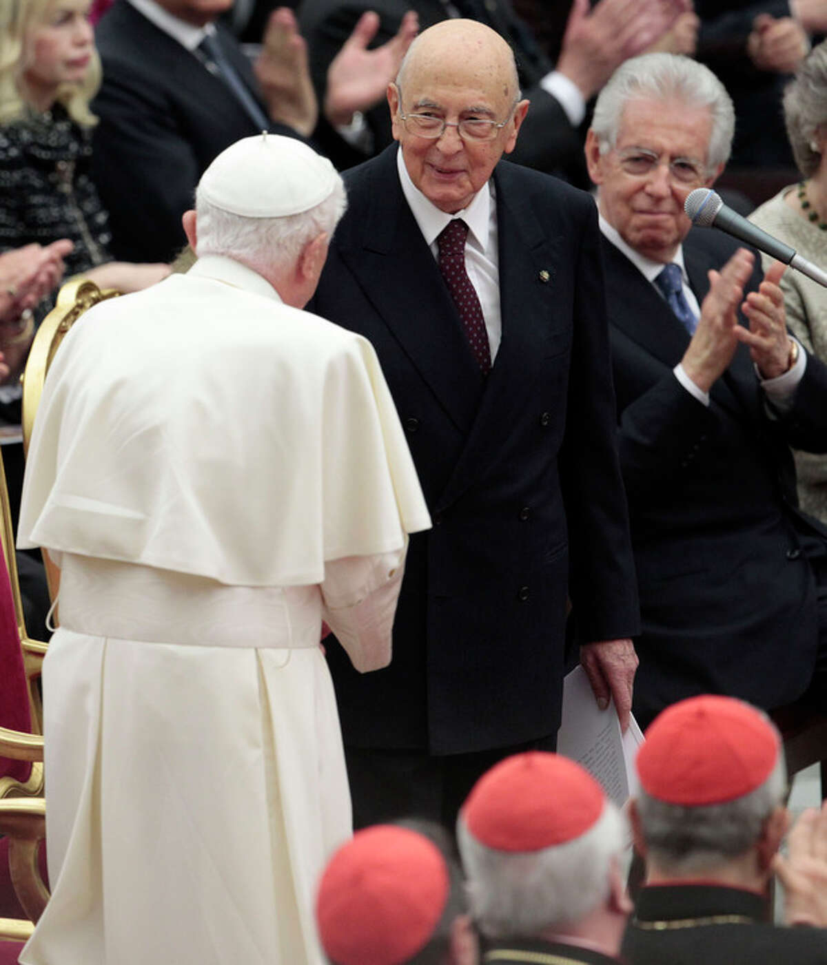 Pope Benedict XVI greets Italian President Giorgio Napolitano as they wait for the start a concert offered by Italian President to celebrate his Pontificate at the Vatican, Friday, May 11, 2012. (AP Photo/Gregorio Borgia)