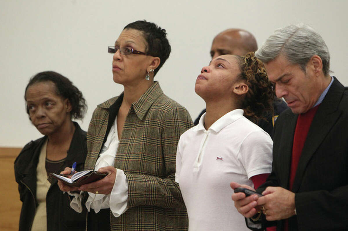 AP photo / The New York Times, Chang W. Lee In this April 6, 2011 photo, Loretta Brett, far left, and daughter Carlotta Brett-Pierce, second from right, listen as a judge in the Brooklyn borough of New York prohibits Carlotta Brett-Pierce from being near her surviving children. Prosecutors are wrapping up their case against the two women charged with murder in the death of 4-year-old Marchella, who was found dead in September 2010. She weighed half what a toddler her age should and had bruises and cuts on her body. Also pictured are attorneys Julie A. Clark and Alan I. Stutman.