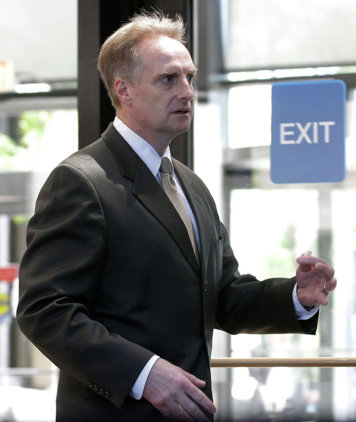 James McKay, lead prosecutor in the William Balfour murder trial, returns from hearing a question from the jury during deliberations at Cook County Criminal Court, Friday, May 11, 2012, in Chicago. Balfour, is charged in the 2008 murder of Oscar and Grammy winning performer Jennifer Hudson's mother, brother and nephew. (AP Photo/M. Spencer Green)