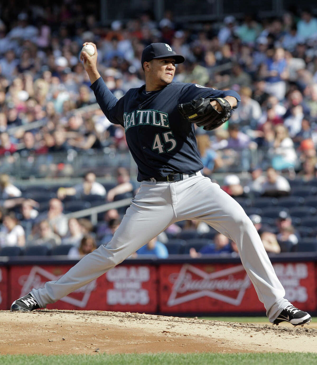 Seattle Mariners pitcher Hector Noesi throws in the third inning of a baseball game against the New York Yankees on Saturday, May 12, 2012 in New York. (AP PhotoPeter Morgan)