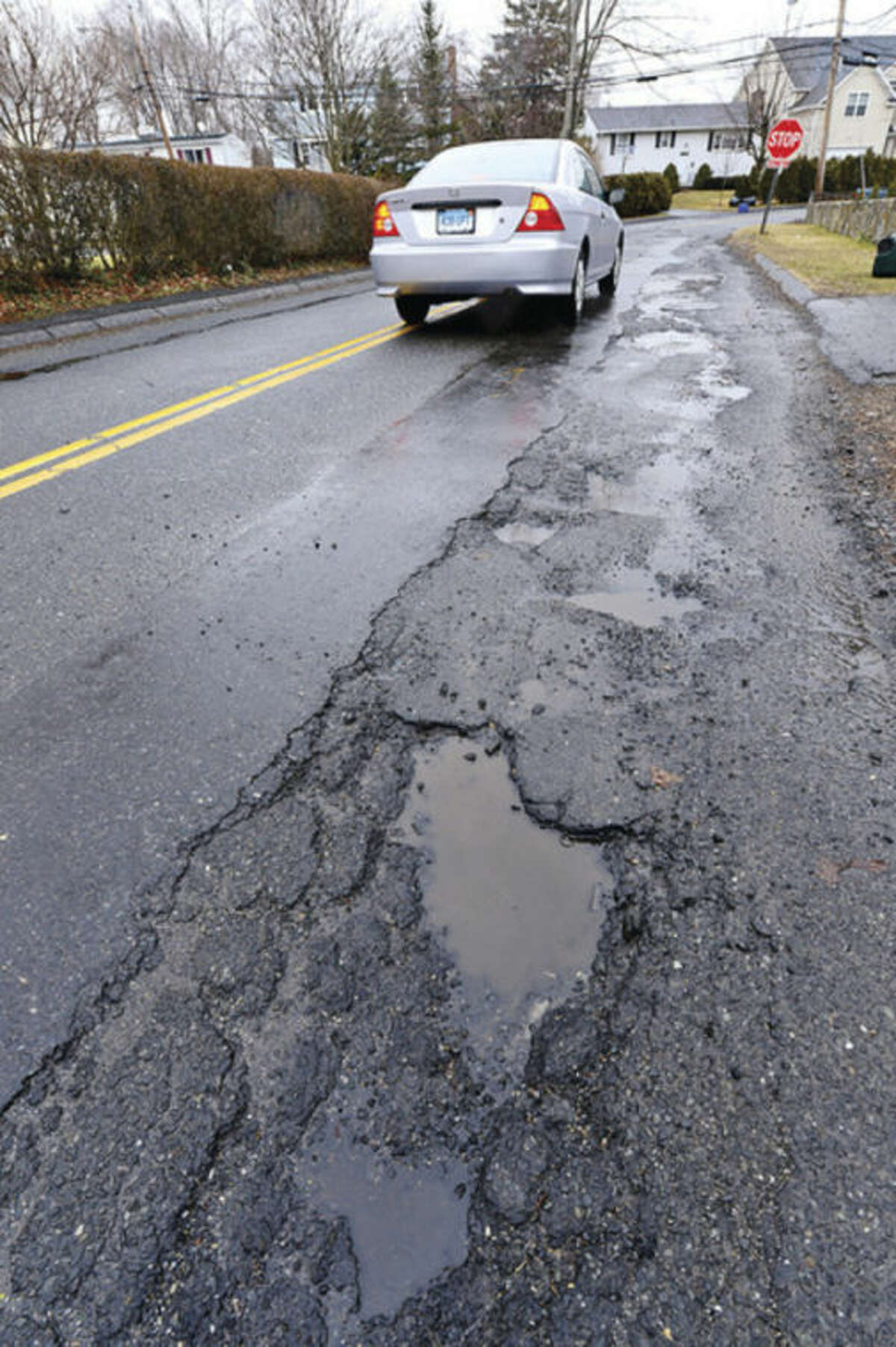 Hour photo / Erik Trautmann Seventy-five streets in Norwalk are listed to be paved this year by the city's DPW, including Dry Hill Road.