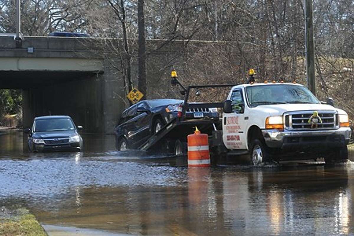 Flooding from Sunday''s storm causing cars to be stuck along Keeler Avenue in Norwalk on Monday. hour photo/matthew vinci